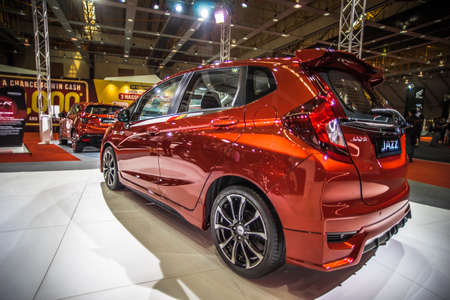 Kuala Lumpur, Malaysia â April 11, 2019 â Car and motocycle displayed at Moto Show in Kuala Lumpur. Exhibitors present most interesting aspects of the automotive industry. The image contains certain grain or noise and soft focus.のeditorial素材