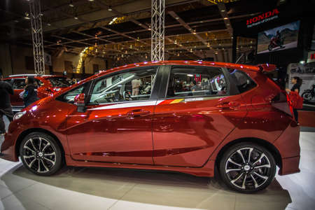 Kuala Lumpur, Malaysia â April 11, 2019 â Car and motocycle displayed at Moto Show in Kuala Lumpur. Exhibitors present most interesting aspects of the automotive industry. The image contains certain grain or noise and soft focus.のeditorial素材