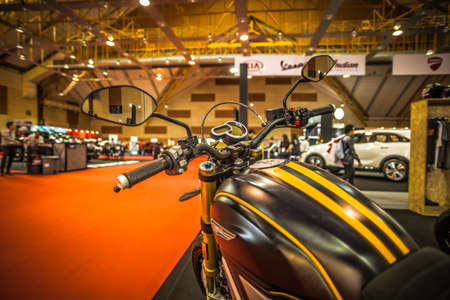 Kuala Lumpur, Malaysia â April 11, 2019 â Car and motocycle displayed at Moto Show in Kuala Lumpur. Exhibitors present most interesting aspects of the automotive industry. The image contains certain grain or noise and soft focus.のeditorial素材