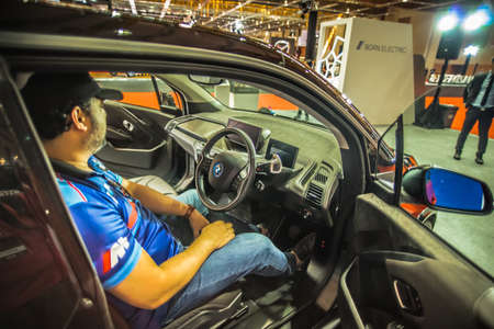Kuala Lumpur, Malaysia â April 11, 2019 â Car and motocycle displayed at Moto Show in Kuala Lumpur. Exhibitors present most interesting aspects of the automotive industry. The image contains certain grain or noise and soft focus.のeditorial素材