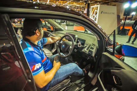 Kuala Lumpur, Malaysia â April 11, 2019 â Car and motocycle displayed at Moto Show in Kuala Lumpur. Exhibitors present most interesting aspects of the automotive industry. The image contains certain grain or noise and soft focus.のeditorial素材