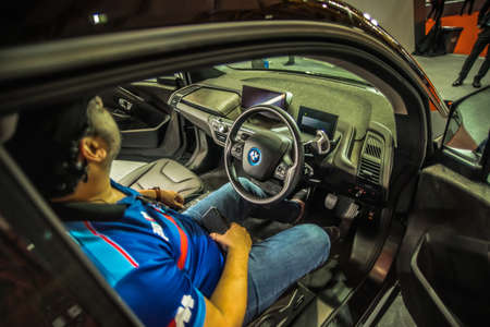 Kuala Lumpur, Malaysia â April 11, 2019 â Car and motocycle displayed at Moto Show in Kuala Lumpur. Exhibitors present most interesting aspects of the automotive industry. The image contains certain grain or noise and soft focus.のeditorial素材