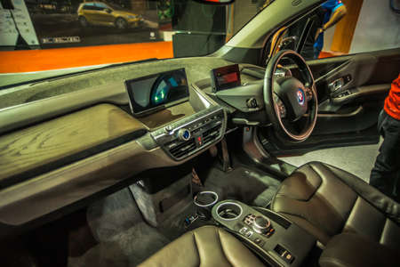 Kuala Lumpur, Malaysia â April 11, 2019 â Car and motocycle displayed at Moto Show in Kuala Lumpur. Exhibitors present most interesting aspects of the automotive industry. The image contains certain grain or noise and soft focus.のeditorial素材