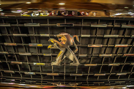Kuala Lumpur, Malaysia â April 11, 2019 â Car and motocycle displayed at Moto Show in Kuala Lumpur. Exhibitors present most interesting aspects of the automotive industry. The image contains certain grain or noise and soft focus.のeditorial素材