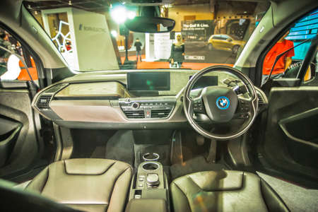 Kuala Lumpur, Malaysia â April 11, 2019 â Car and motocycle displayed at Moto Show in Kuala Lumpur. Exhibitors present most interesting aspects of the automotive industry. The image contains certain grain or noise and soft focus.のeditorial素材
