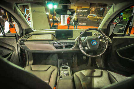 Kuala Lumpur, Malaysia â April 11, 2019 â Car and motocycle displayed at Moto Show in Kuala Lumpur. Exhibitors present most interesting aspects of the automotive industry. The image contains certain grain or noise and soft focus.のeditorial素材