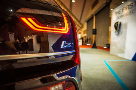 Kuala Lumpur, Malaysia â April 11, 2019 â Car and motocycle displayed at Moto Show in Kuala Lumpur. Exhibitors present most interesting aspects of the automotive industry. The image contains certain grain or noise and soft focus.のeditorial素材