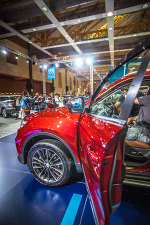 Kuala Lumpur, Malaysia â April 11, 2019 â Car and motocycle displayed at Moto Show in Kuala Lumpur. Exhibitors present most interesting aspects of the automotive industry. The image contains certain grain or noise and soft focus.のeditorial素材