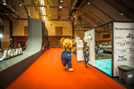 Kuala Lumpur, Malaysia â April 11, 2019 â Car and motocycle displayed at Moto Show in Kuala Lumpur. Exhibitors present most interesting aspects of the automotive industry. The image contains certain grain or noise and soft focus.のeditorial素材