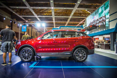 Kuala Lumpur, Malaysia â April 11, 2019 â Car and motocycle displayed at Moto Show in Kuala Lumpur. Exhibitors present most interesting aspects of the automotive industry. The image contains certain grain or noise and soft focus.のeditorial素材