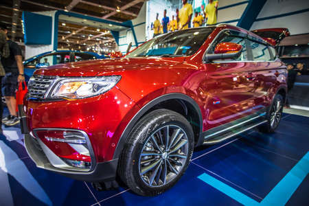 Kuala Lumpur, Malaysia â April 11, 2019 â Car and motocycle displayed at Moto Show in Kuala Lumpur. Exhibitors present most interesting aspects of the automotive industry. The image contains certain grain or noise and soft focus.のeditorial素材