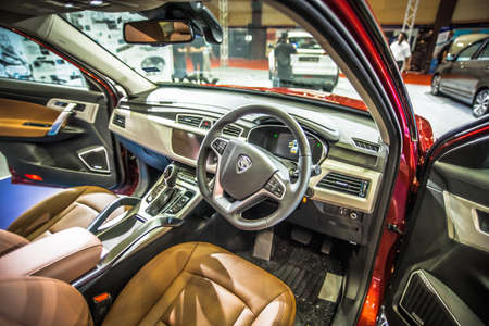 Kuala Lumpur, Malaysia â April 11, 2019 â Car and motocycle displayed at Moto Show in Kuala Lumpur. Exhibitors present most interesting aspects of the automotive industry. The image contains certain grain or noise and soft focus.のeditorial素材