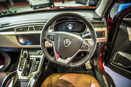 Kuala Lumpur, Malaysia â April 11, 2019 â Car and motocycle displayed at Moto Show in Kuala Lumpur. Exhibitors present most interesting aspects of the automotive industry. The image contains certain grain or noise and soft focus.のeditorial素材