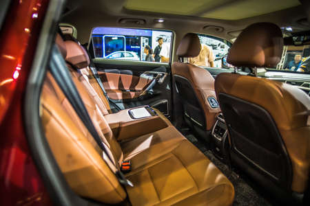Kuala Lumpur, Malaysia â April 11, 2019 â Car and motocycle displayed at Moto Show in Kuala Lumpur. Exhibitors present most interesting aspects of the automotive industry. The image contains certain grain or noise and soft focus.のeditorial素材