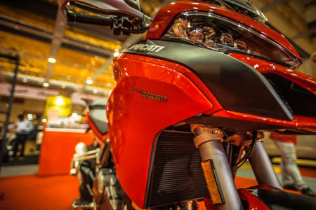 Kuala Lumpur, Malaysia  April 11, 2019  Car and motocycle displayed at Moto Show in Kuala Lumpur. Exhibitors present most interesting aspects of the automotive industry. The image contains certain grain or noise and soft focus.のeditorial素材