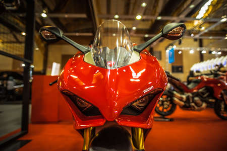 Kuala Lumpur, Malaysia â April 11, 2019 â Car and motocycle displayed at Moto Show in Kuala Lumpur. Exhibitors present most interesting aspects of the automotive industry. The image contains certain grain or noise and soft focus.のeditorial素材