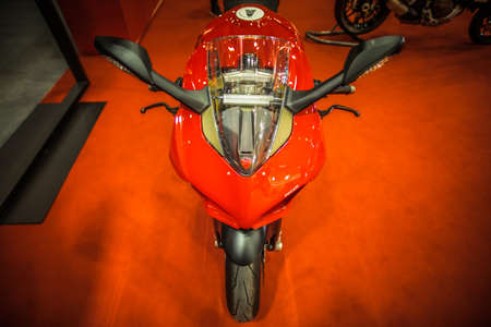 Kuala Lumpur, Malaysia â April 11, 2019 â Car and motocycle displayed at Moto Show in Kuala Lumpur. Exhibitors present most interesting aspects of the automotive industry. The image contains certain grain or noise and soft focus.のeditorial素材