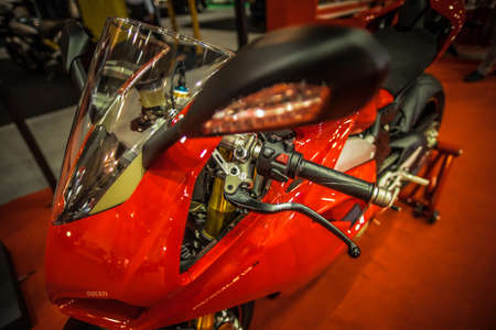 Kuala Lumpur, Malaysia â April 11, 2019 â Car and motocycle displayed at Moto Show in Kuala Lumpur. Exhibitors present most interesting aspects of the automotive industry. The image contains certain grain or noise and soft focus.のeditorial素材