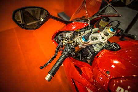 Kuala Lumpur, Malaysia â April 11, 2019 â Car and motocycle displayed at Moto Show in Kuala Lumpur. Exhibitors present most interesting aspects of the automotive industry. The image contains certain grain or noise and soft focus.のeditorial素材