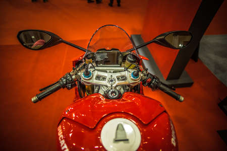 Kuala Lumpur, Malaysia â April 11, 2019 â Car and motocycle displayed at Moto Show in Kuala Lumpur. Exhibitors present most interesting aspects of the automotive industry. The image contains certain grain or noise and soft focus.のeditorial素材