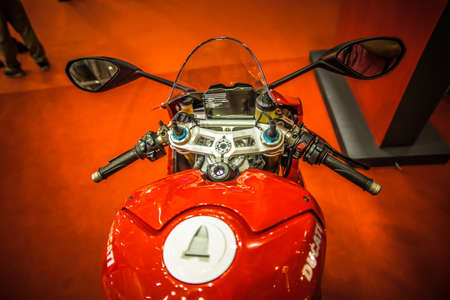 Kuala Lumpur, Malaysia â April 11, 2019 â Car and motocycle displayed at Moto Show in Kuala Lumpur. Exhibitors present most interesting aspects of the automotive industry. The image contains certain grain or noise and soft focus.のeditorial素材