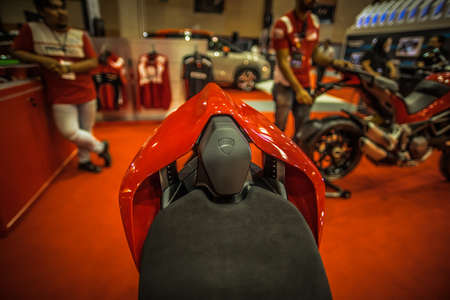 Kuala Lumpur, Malaysia â April 11, 2019 â Car and motocycle displayed at Moto Show in Kuala Lumpur. Exhibitors present most interesting aspects of the automotive industry. The image contains certain grain or noise and soft focus.のeditorial素材