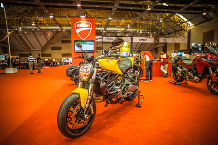 Kuala Lumpur, Malaysia â April 11, 2019 â Car and motocycle displayed at Moto Show in Kuala Lumpur. Exhibitors present most interesting aspects of the automotive industry. The image contains certain grain or noise and soft focus.のeditorial素材