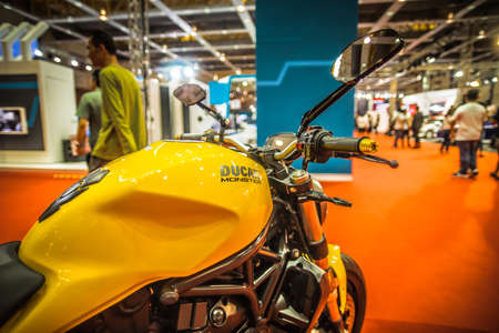 Kuala Lumpur, Malaysia â April 11, 2019 â Car and motocycle displayed at Moto Show in Kuala Lumpur. Exhibitors present most interesting aspects of the automotive industry. The image contains certain grain or noise and soft focus.のeditorial素材