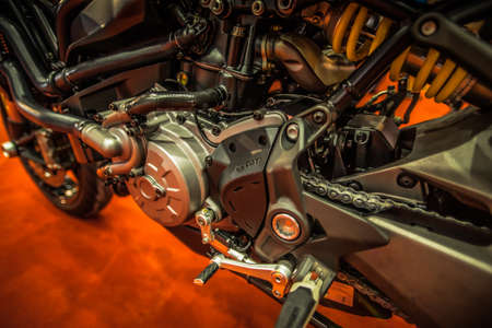 Kuala Lumpur, Malaysia â April 11, 2019 â Car and motocycle displayed at Moto Show in Kuala Lumpur. Exhibitors present most interesting aspects of the automotive industry. The image contains certain grain or noise and soft focus.のeditorial素材