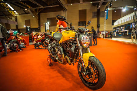 Kuala Lumpur, Malaysia â April 11, 2019 â Car and motocycle displayed at Moto Show in Kuala Lumpur. Exhibitors present most interesting aspects of the automotive industry. The image contains certain grain or noise and soft focus.のeditorial素材
