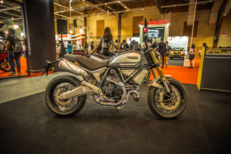 Kuala Lumpur, Malaysia â April 11, 2019 â Car and motocycle displayed at Moto Show in Kuala Lumpur. Exhibitors present most interesting aspects of the automotive industry. The image contains certain grain or noise and soft focus.のeditorial素材