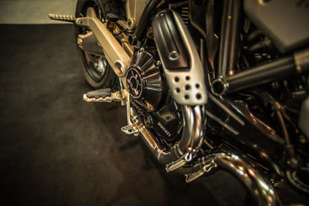 Kuala Lumpur, Malaysia â April 11, 2019 â Car and motocycle displayed at Moto Show in Kuala Lumpur. Exhibitors present most interesting aspects of the automotive industry. The image contains certain grain or noise and soft focus.のeditorial素材