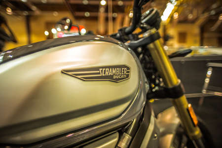 Kuala Lumpur, Malaysia â April 11, 2019 â Car and motocycle displayed at Moto Show in Kuala Lumpur. Exhibitors present most interesting aspects of the automotive industry. The image contains certain grain or noise and soft focus.のeditorial素材