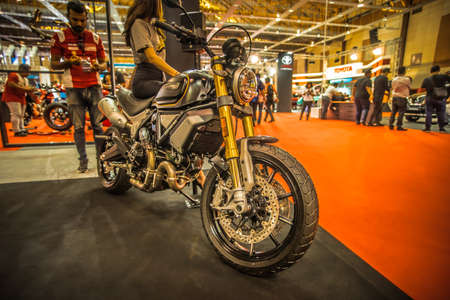 Kuala Lumpur, Malaysia â April 11, 2019 â Car and motocycle displayed at Moto Show in Kuala Lumpur. Exhibitors present most interesting aspects of the automotive industry. The image contains certain grain or noise and soft focus.のeditorial素材