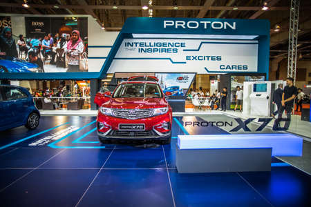 Kuala Lumpur, Malaysia â April 11, 2019 â Car and motocycle displayed at Moto Show in Kuala Lumpur. Exhibitors present most interesting aspects of the automotive industry. The image contains certain grain or noise and soft focus.のeditorial素材