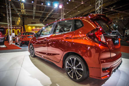 Kuala Lumpur, Malaysia â April 11, 2019 â Car and motocycle displayed at Moto Show in Kuala Lumpur. Exhibitors present most interesting aspects of the automotive industry. The image contains certain grain or noise and soft focus.のeditorial素材