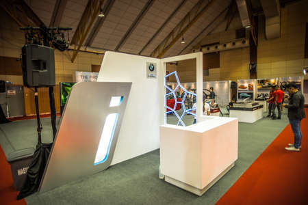 Kuala Lumpur, Malaysia â April 11, 2019 â Car and motocycle displayed at Moto Show in Kuala Lumpur. Exhibitors present most interesting aspects of the automotive industry. The image contains certain grain or noise and soft focus.のeditorial素材