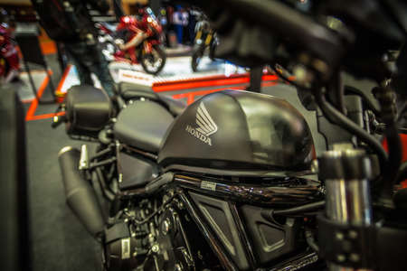 Kuala Lumpur, Malaysia â April 11, 2019 â Car and motocycle displayed at Moto Show in Kuala Lumpur. Exhibitors present most interesting aspects of the automotive industry. The image contains certain grain or noise and soft focus.のeditorial素材