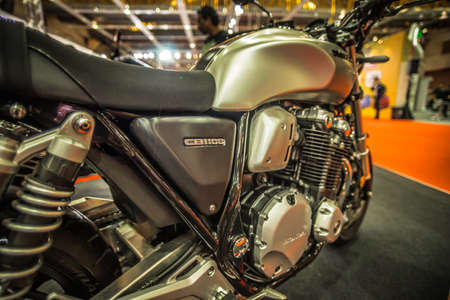 Kuala Lumpur, Malaysia â April 11, 2019 â Car and motocycle displayed at Moto Show in Kuala Lumpur. Exhibitors present most interesting aspects of the automotive industry. The image contains certain grain or noise and soft focus.のeditorial素材