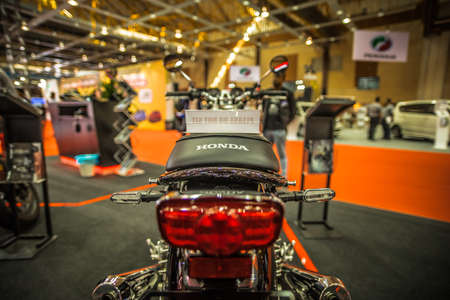 Kuala Lumpur, Malaysia â April 11, 2019 â Car and motocycle displayed at Moto Show in Kuala Lumpur. Exhibitors present most interesting aspects of the automotive industry. The image contains certain grain or noise and soft focus.のeditorial素材