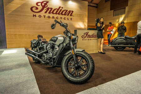 Kuala Lumpur, Malaysia â April 11, 2019 â Car and motocycle displayed at Moto Show in Kuala Lumpur. Exhibitors present most interesting aspects of the automotive industry. The image contains certain grain or noise and soft focus.のeditorial素材