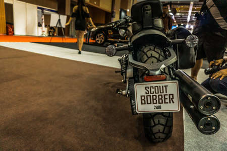 Kuala Lumpur, Malaysia â April 11, 2019 â Car and motocycle displayed at Moto Show in Kuala Lumpur. Exhibitors present most interesting aspects of the automotive industry. The image contains certain grain or noise and soft focus.のeditorial素材
