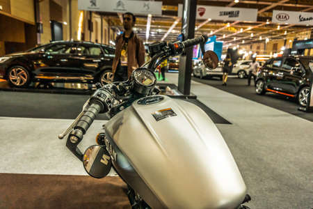 Kuala Lumpur, Malaysia â April 11, 2019 â Car and motocycle displayed at Moto Show in Kuala Lumpur. Exhibitors present most interesting aspects of the automotive industry. The image contains certain grain or noise and soft focus.のeditorial素材