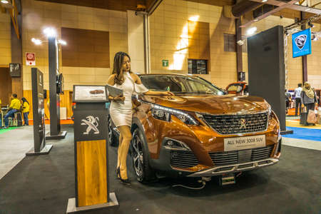 Kuala Lumpur, Malaysia â April 11, 2019 â Car and motocycle displayed at Moto Show in Kuala Lumpur. Exhibitors present most interesting aspects of the automotive industry. The image contains certain grain or noise and soft focus.のeditorial素材