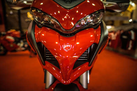 Kuala Lumpur, Malaysia  April 11, 2019  Car and motocycle displayed at Moto Show in Kuala Lumpur. Exhibitors present most interesting aspects of the automotive industry. The image contains certain grain or noise and soft focus.のeditorial素材