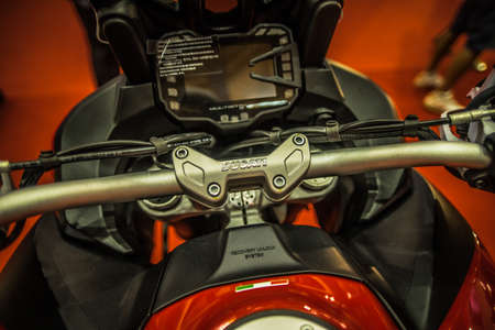 Kuala Lumpur, Malaysia â April 11, 2019 â Car and motocycle displayed at Moto Show in Kuala Lumpur. Exhibitors present most interesting aspects of the automotive industry. The image contains certain grain or noise and soft focus.のeditorial素材