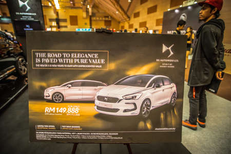 Kuala Lumpur, Malaysia â April 11, 2019 â Car and motocycle displayed at Moto Show in Kuala Lumpur. Exhibitors present most interesting aspects of the automotive industry. The image contains certain grain or noise and soft focus.のeditorial素材