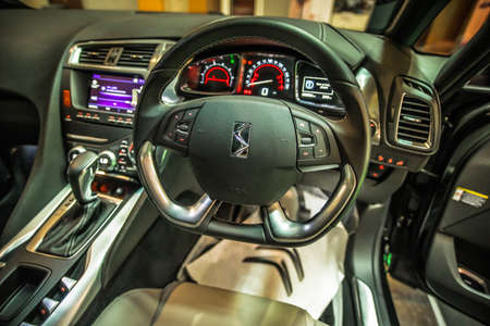 Kuala Lumpur, Malaysia â April 11, 2019 â Car and motocycle displayed at Moto Show in Kuala Lumpur. Exhibitors present most interesting aspects of the automotive industry. The image contains certain grain or noise and soft focus.のeditorial素材