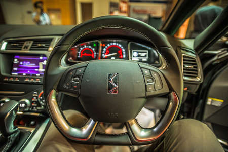Kuala Lumpur, Malaysia â April 11, 2019 â Car and motocycle displayed at Moto Show in Kuala Lumpur. Exhibitors present most interesting aspects of the automotive industry. The image contains certain grain or noise and soft focus.のeditorial素材