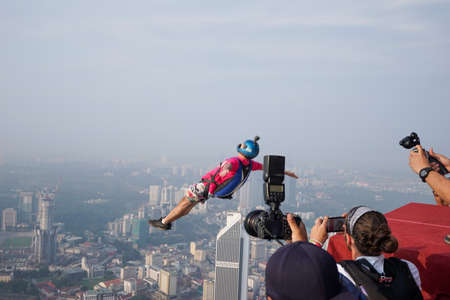 Kuala Lumpur, Malaysia â September 29, 2018: Base Jumpers landed from a 300m high deck during the Kuala Lumpur Tower International Jump.のeditorial素材